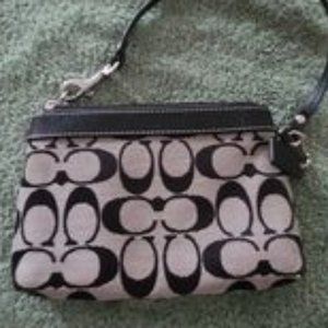 Coach black and cream small wristlet